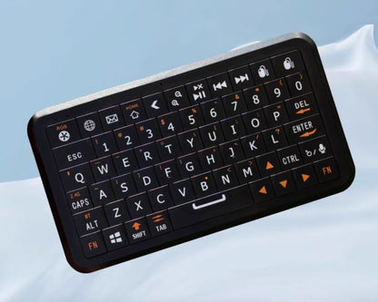 Compact Keyboard with Motion-Sensing Mouse